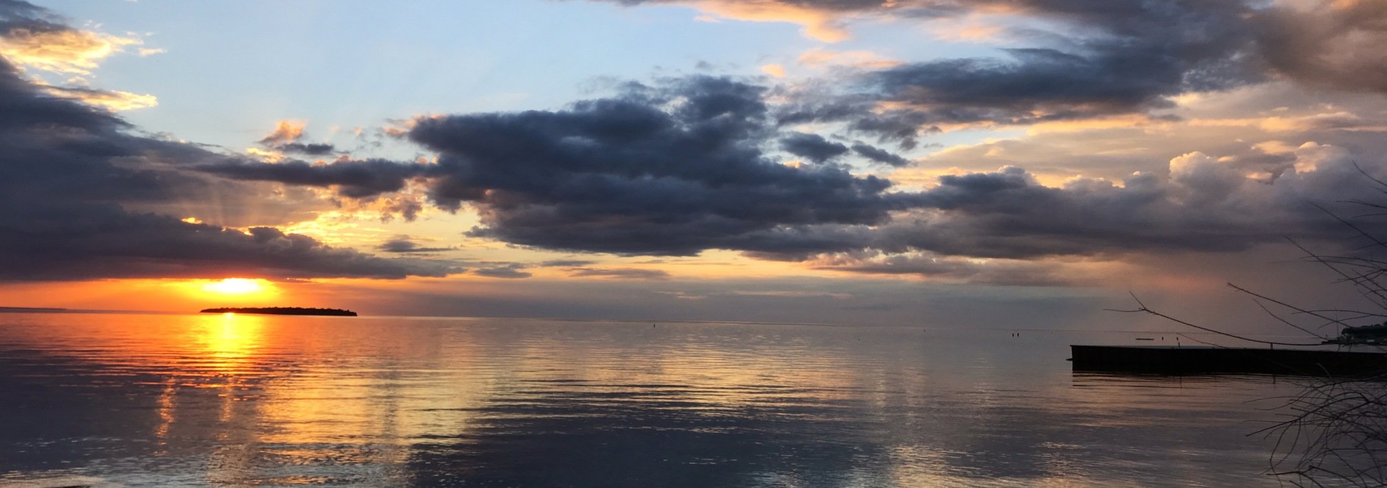 Enjoy a serene Door County sunset from nearby Sister Bay when you stay at Dovetail Acres Campground